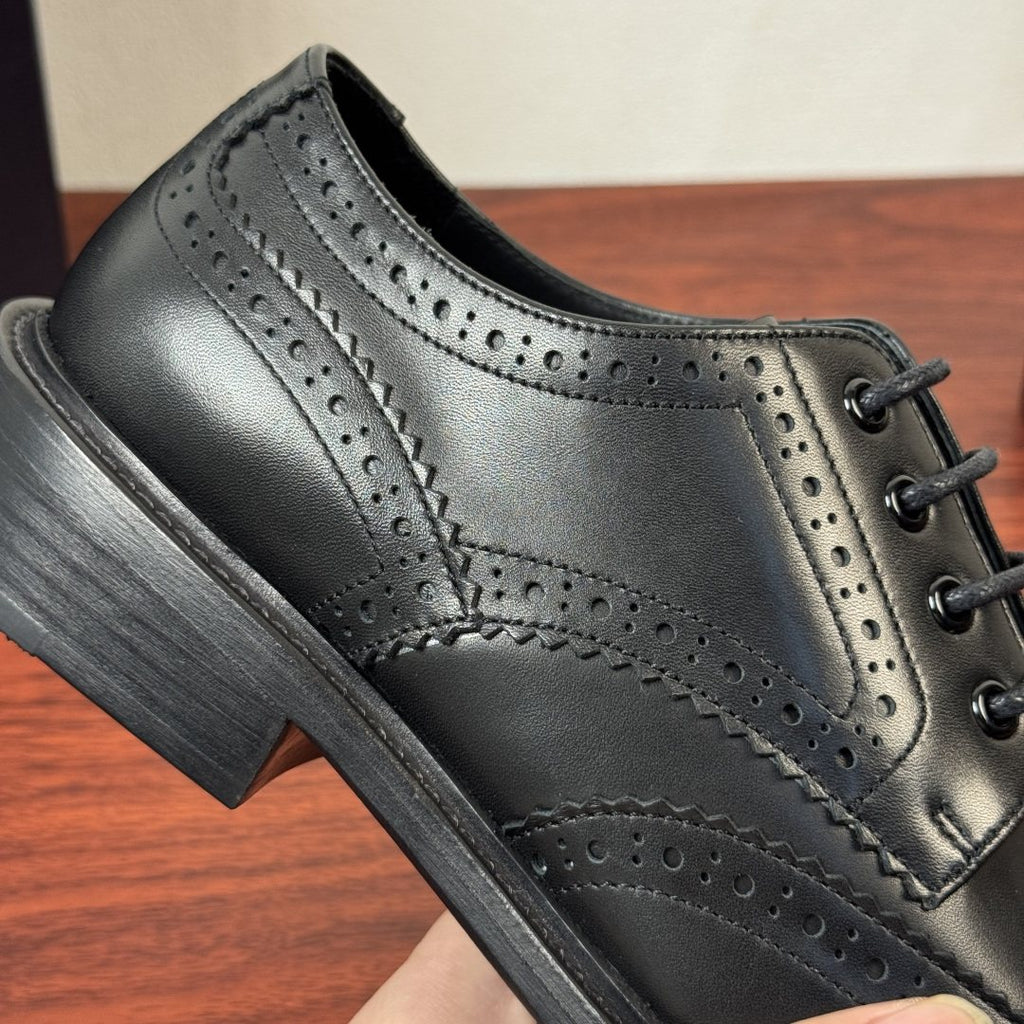Prada Burnished Brogue Derby Shoes — detail