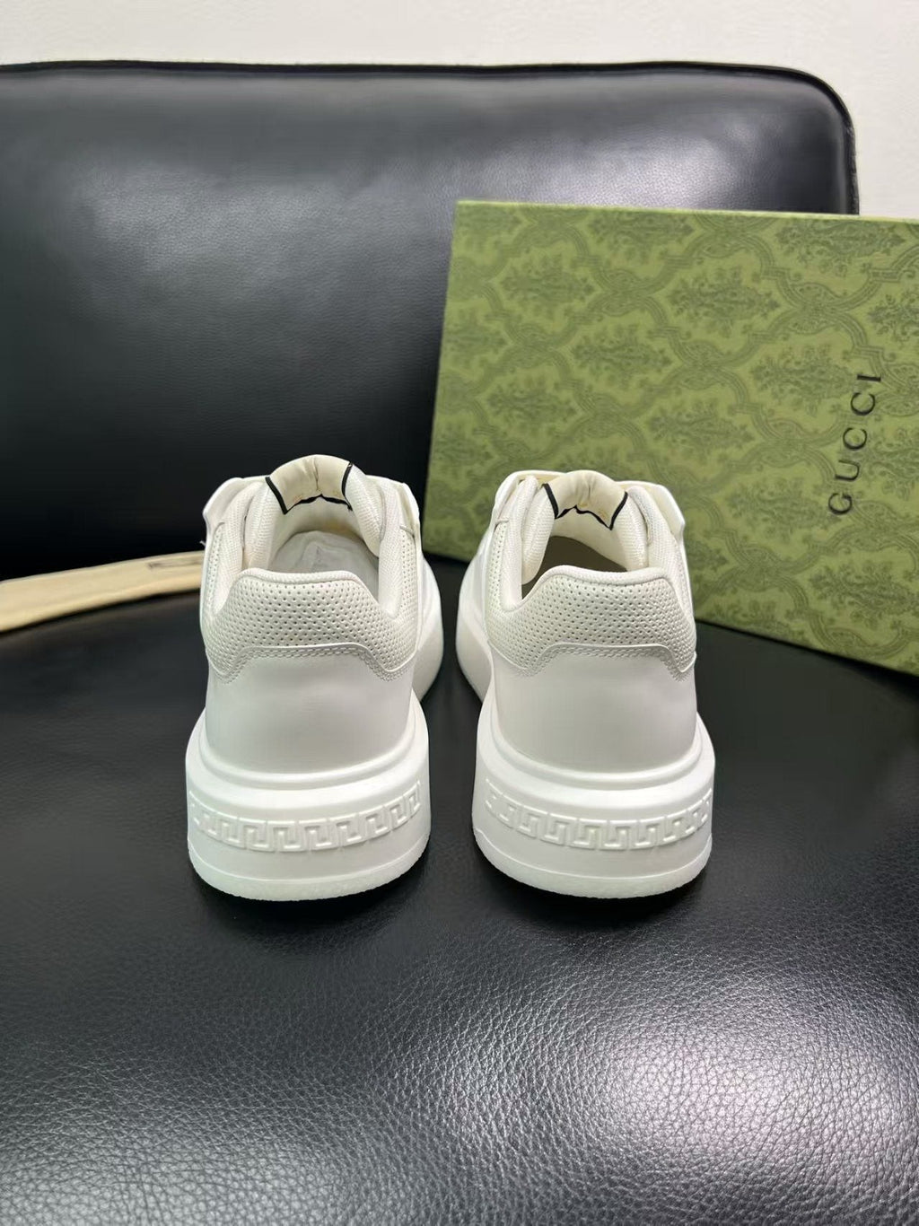 Gucci Embossed Low-Top Sneakers — detail