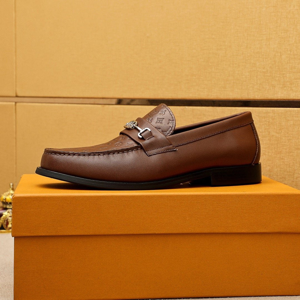 Louis Vuitton Embossed Buckle Loafers — detail