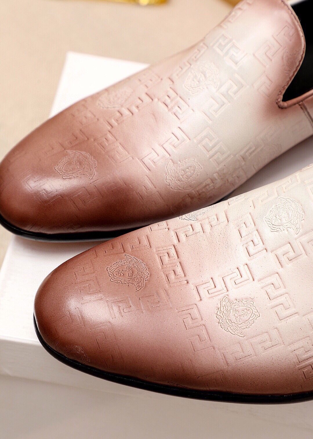 Versace Embossed Leather Slip-On Shoes — detail