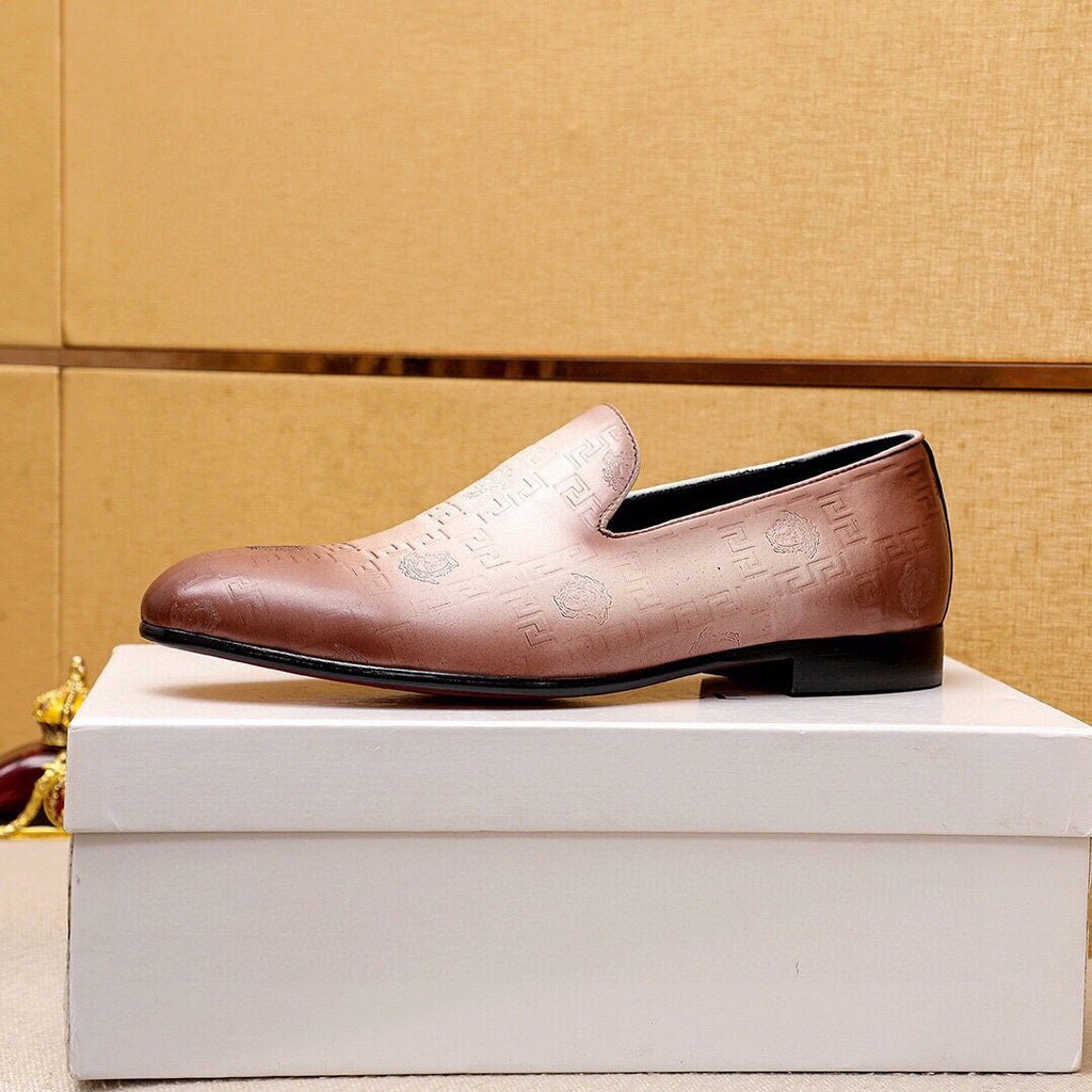 Versace Embossed Leather Slip-On Shoes — detail