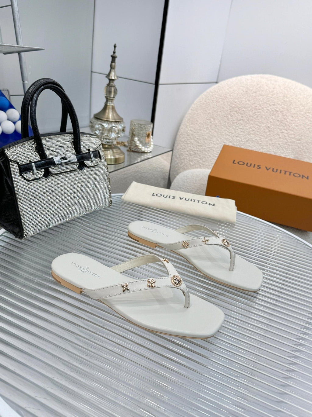 Louis Vuitton Metal-Detail Thong Sandals — front