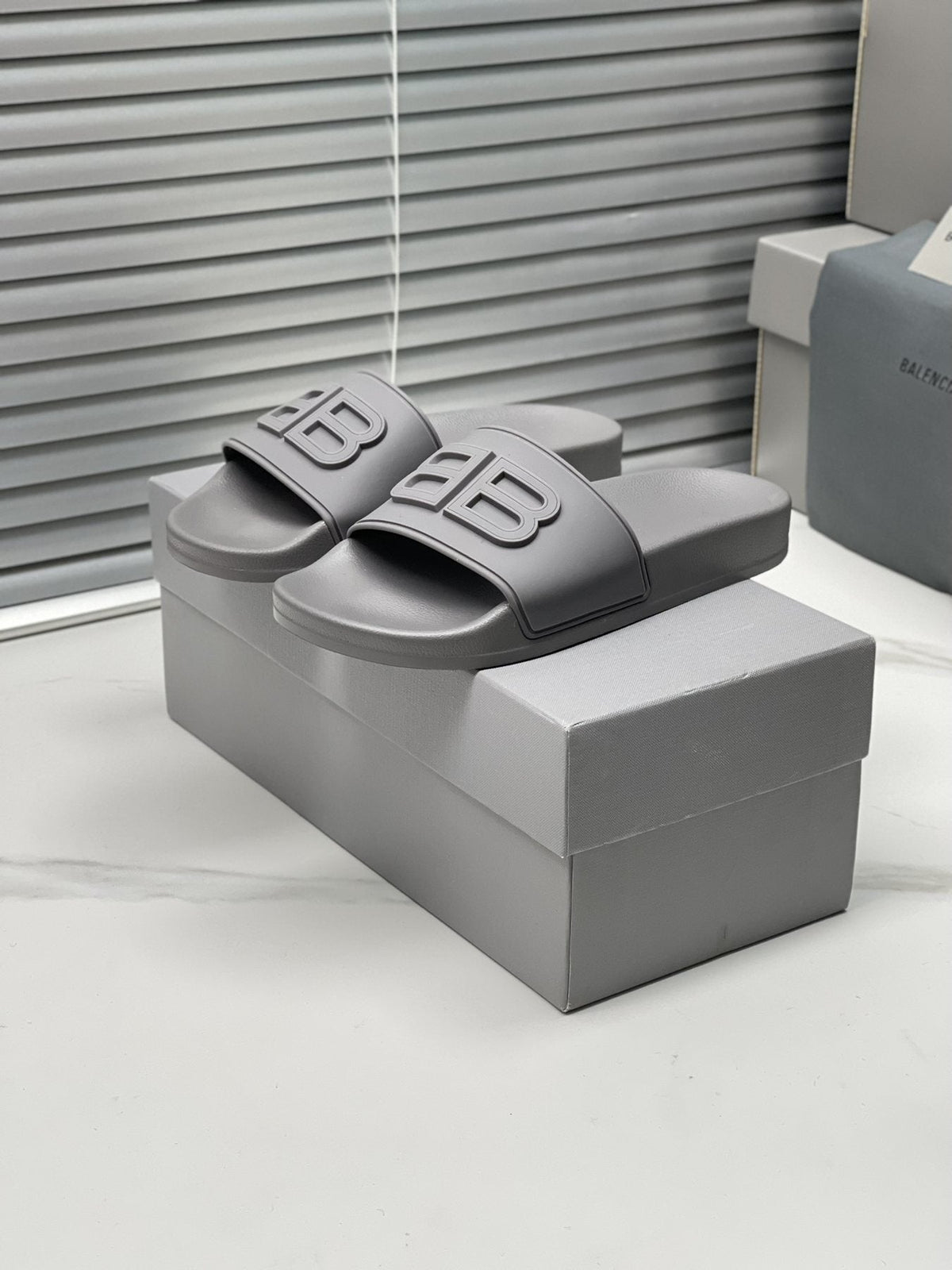 Balenciaga Raised Motif Slide Sandals — front