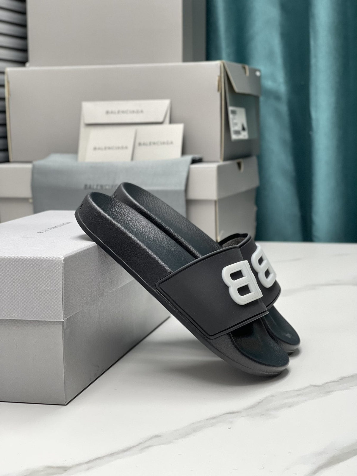 Balenciaga Raised Motif Slide Sandals — front