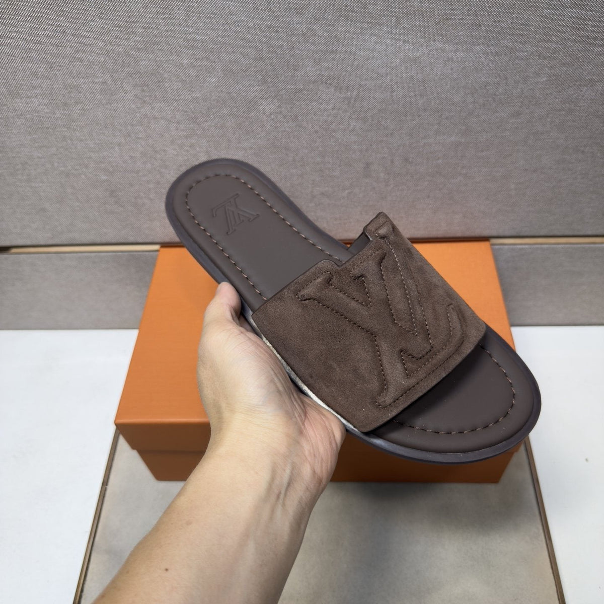 Louis Vuitton Embossed Strap Slide Sandals — model