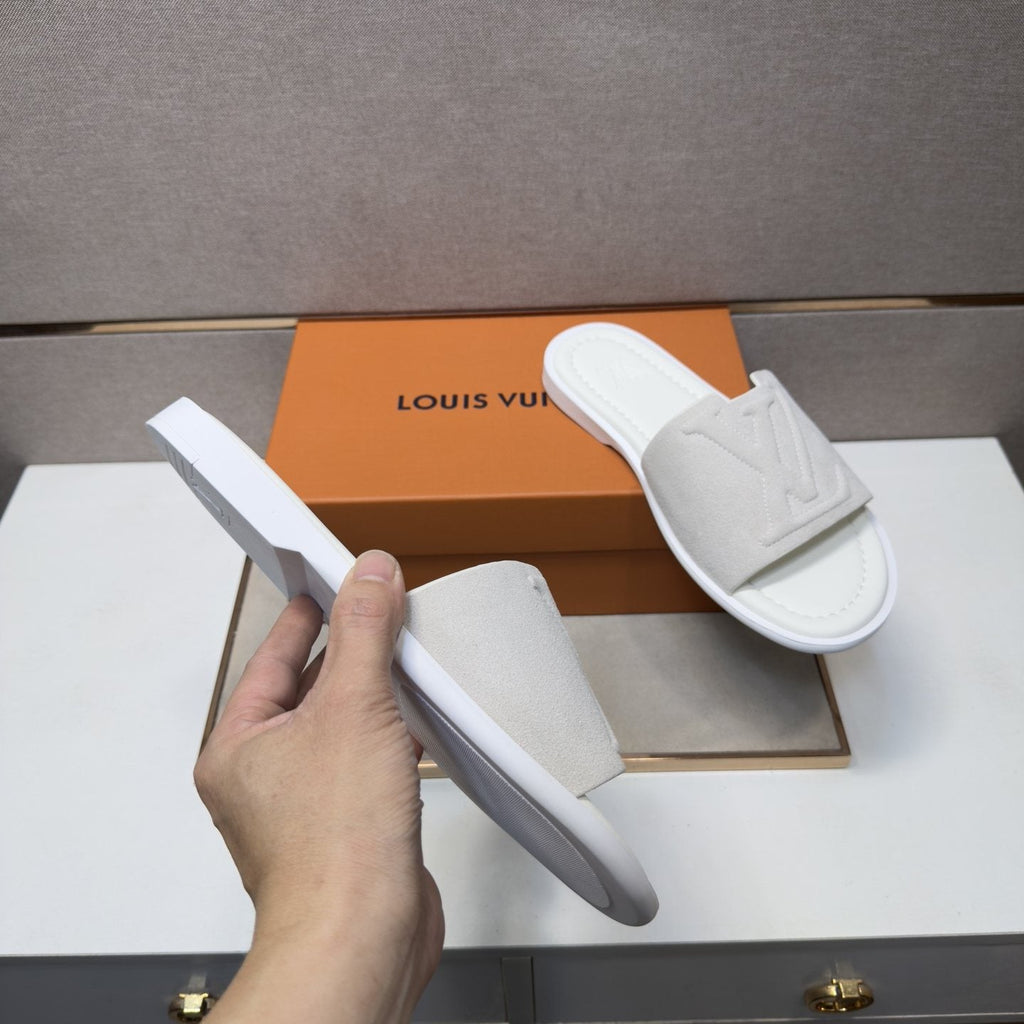 Louis Vuitton Embossed Strap Slide Sandals — model