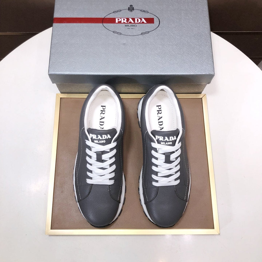 PRADA Black Quilted Low-Top Sneakers — front