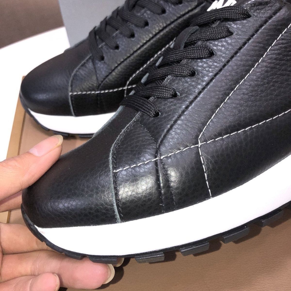 PRADA Black Quilted Low-Top Sneakers — side