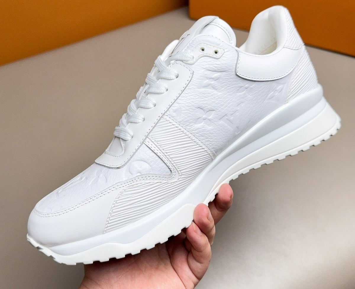 Louis Vuitton Embossed Low-Top Sneakers — hero