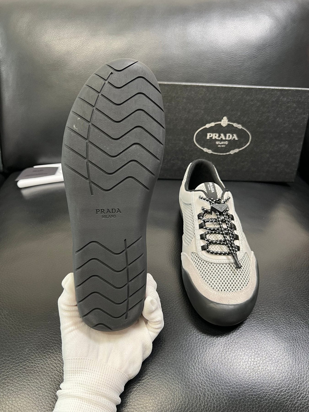 Prada Off-White Perforated Sneakers — detail