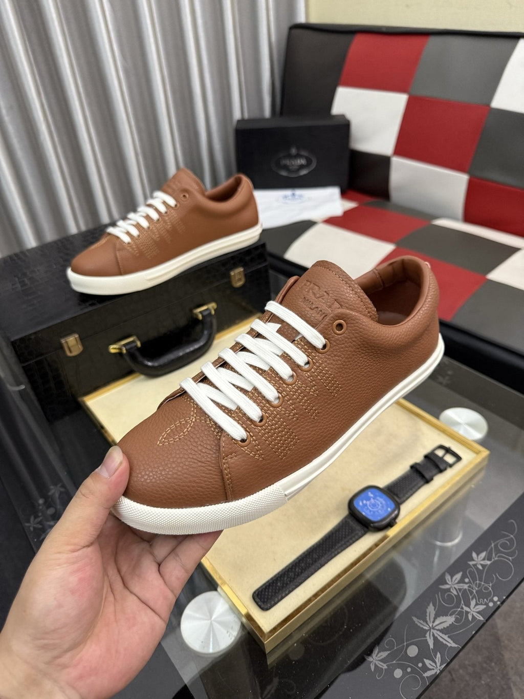 Prada Men's Textured Leather Low-Top Sneakers — model