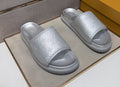 Louis Vuitton Embossed Metallic Slide Sandals — hero